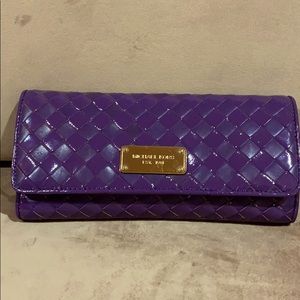 Purple leather woven clutch